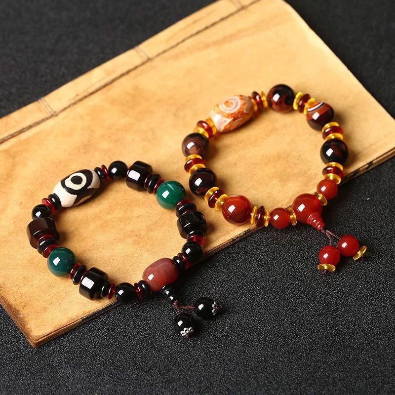 Flowing Fortune Three-Eye Dzi Bracelet — Three Rings, Wealth Drawn Close