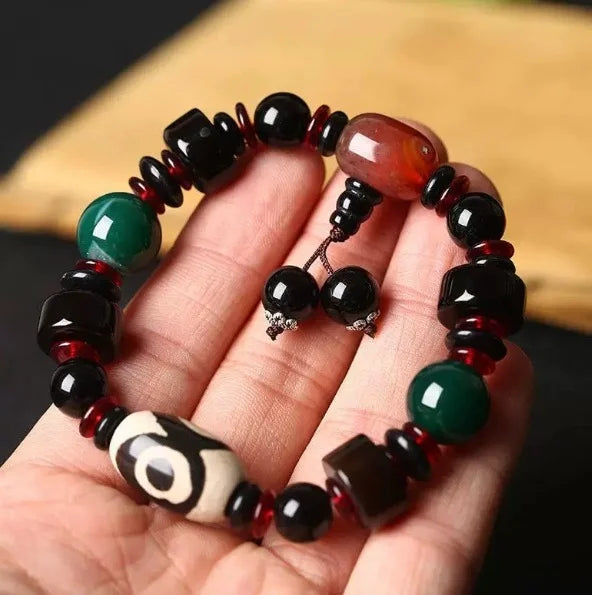 Flowing Fortune Three-Eye Dzi Bracelet — Three Rings, Wealth Drawn Close