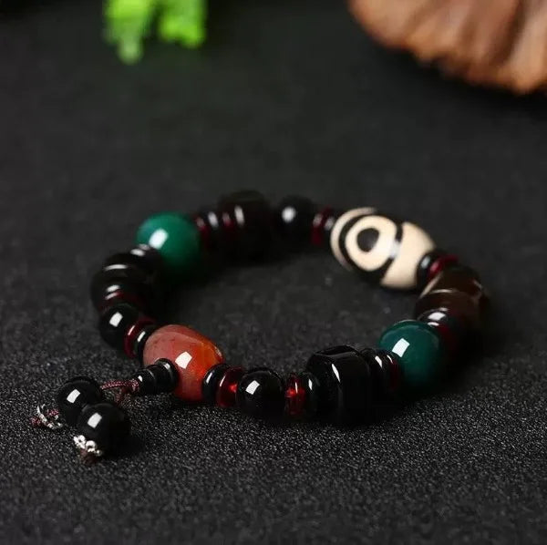 Flowing Fortune Three-Eye Dzi Bracelet — Three Rings, Wealth Drawn Close