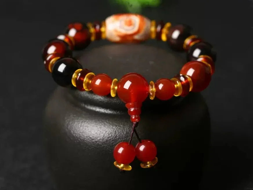 Flowing Fortune Three-Eye Dzi Bracelet — Three Rings, Wealth Drawn Close
