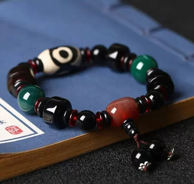 Flowing Fortune Three-Eye Dzi Bracelet — Three Rings, Wealth Drawn Close