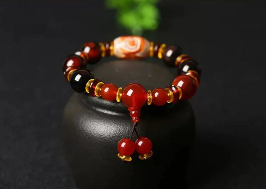 Flowing Fortune Three-Eye Dzi Bracelet — Three Rings, Wealth Drawn Close