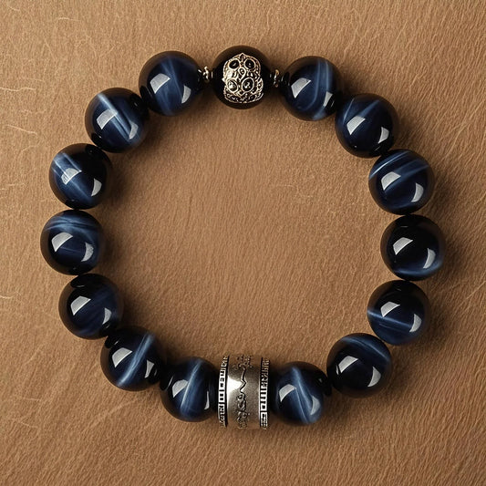 Flowing Resolve Blue Tiger Eye Pendant — Water Carves Stone