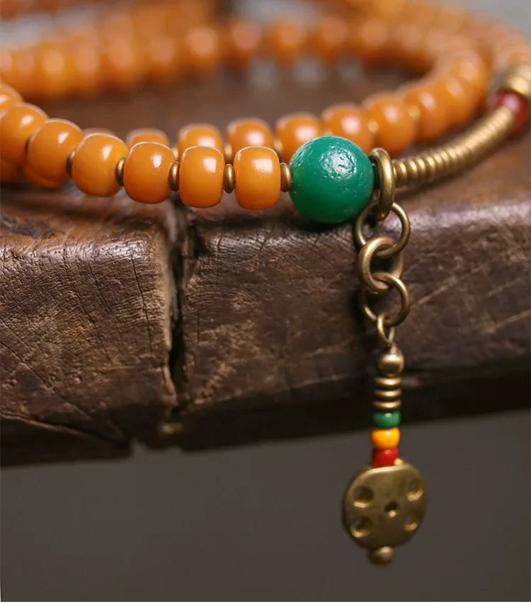 Golden Bodhi 108 Yellow Mala — One Vintage Dzi, One Full Count