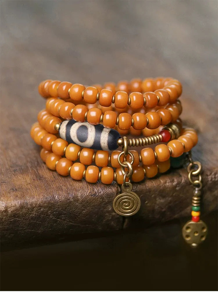 Golden Bodhi 108 Yellow Mala — One Vintage Dzi, One Full Count