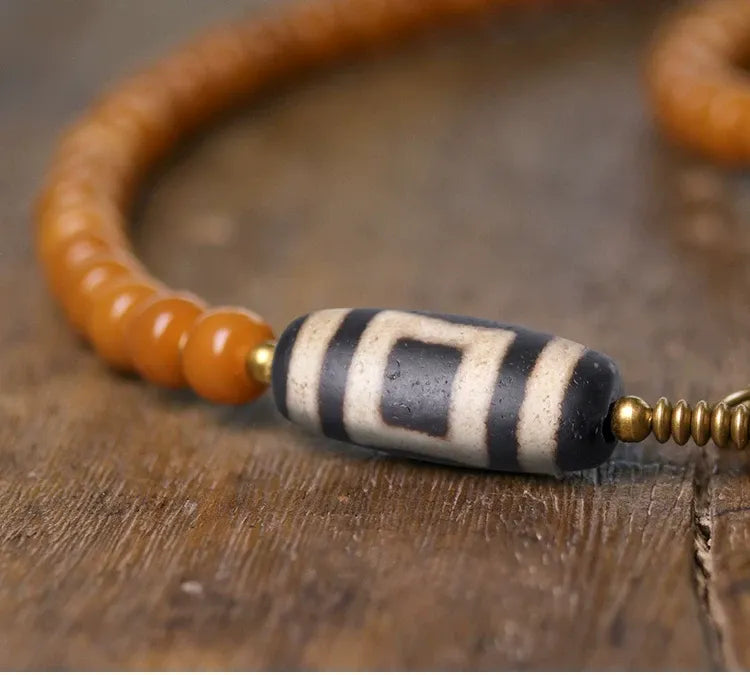 Golden Bodhi 108 Yellow Mala — One Vintage Dzi, One Full Count