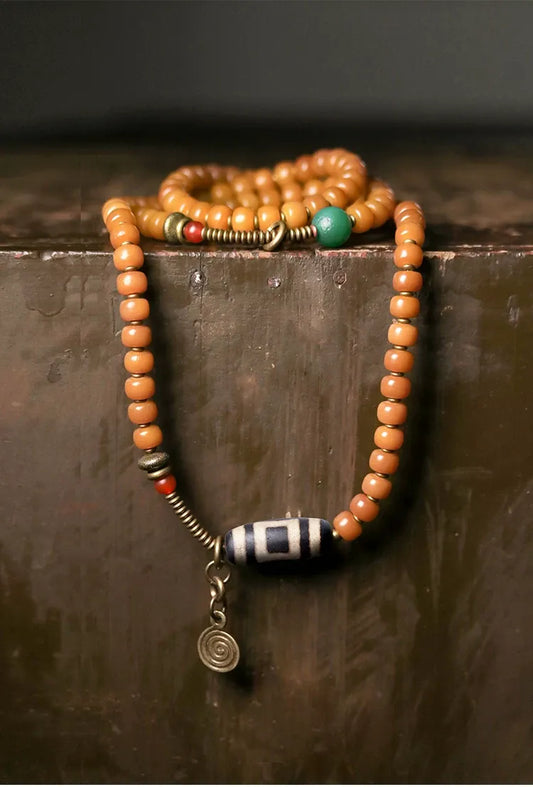 Golden Bodhi 108 Yellow Mala — One Vintage Dzi, One Full Count