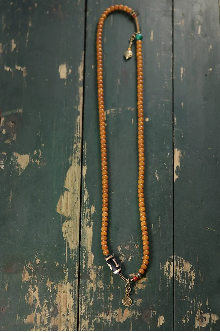 Golden Bodhi 108 Yellow Mala — One Vintage Dzi, One Full Count