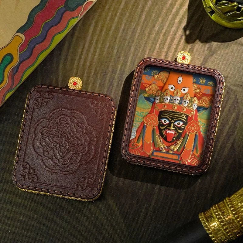 Sacred Visage Zashi Lhamo Thangka Leather Amulet — Hand-Painted, Heart-Carried