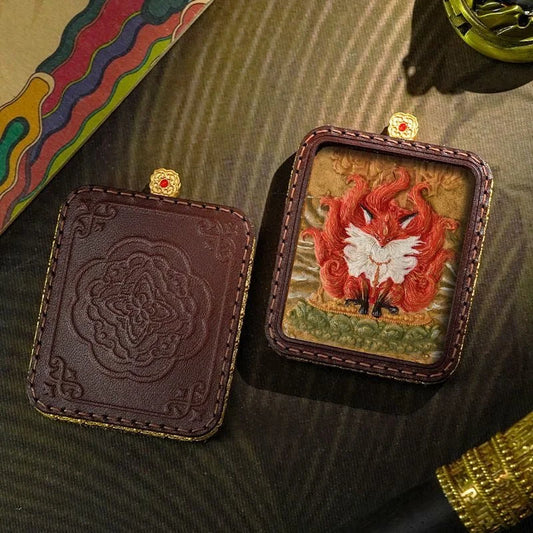 Sacred Visage Zashi Lhamo Thangka Leather Amulet — Hand-Painted, Heart-Carried
