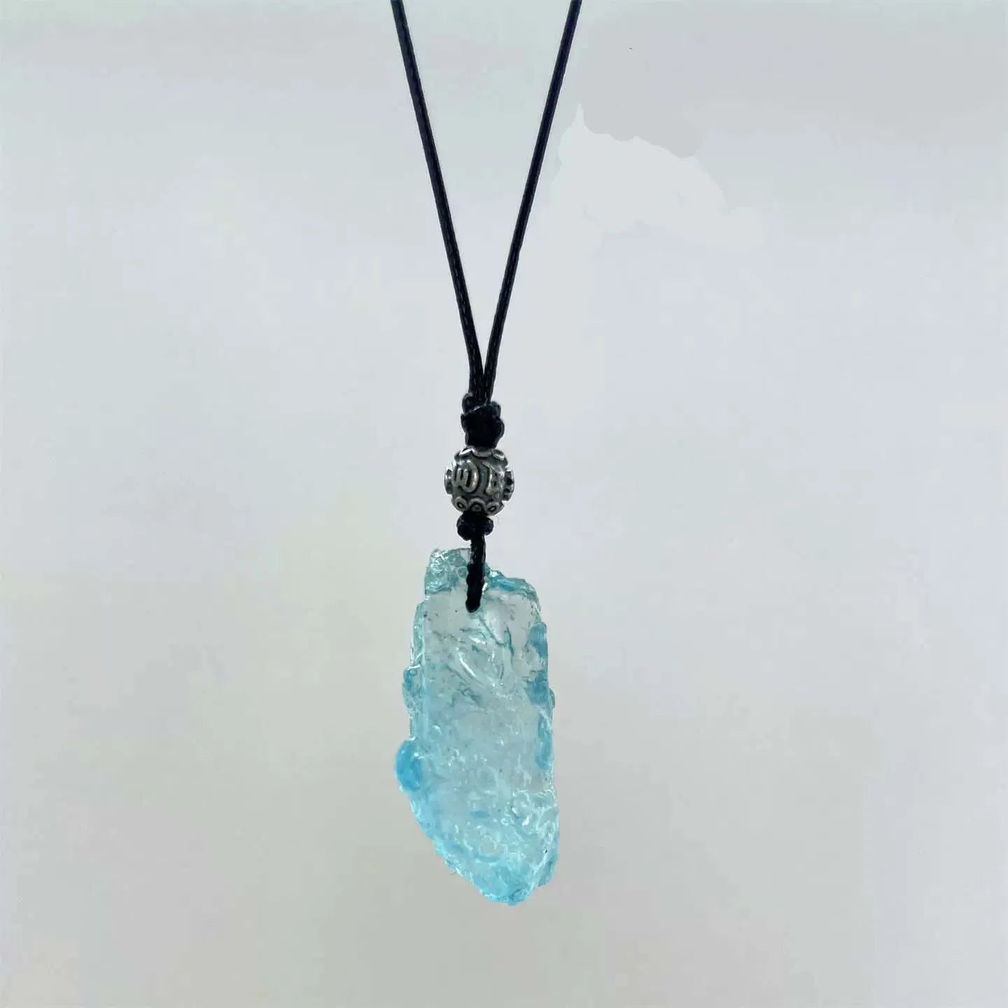 Serene Depth Blue Crystal Pendant — Cool Stone, Quiet Pulse